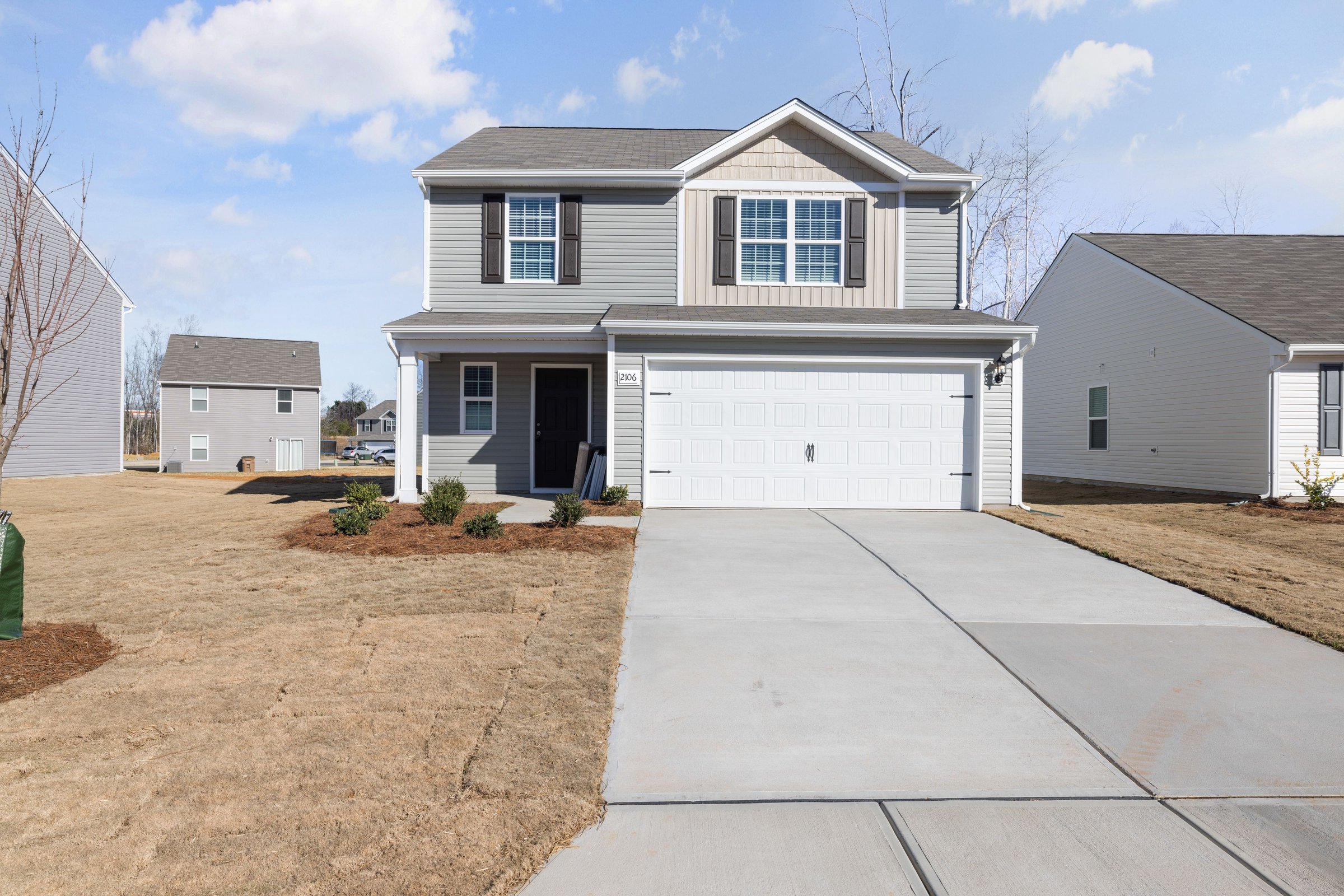 A clean suburban driveway after pressure washing